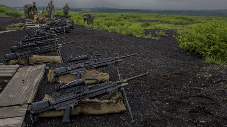 U.S. Marine Corps Pfc. Slade Wood, a cyber network operator with Marine Wing Support Squadron 171, based out of Marine Corps Air Station Iwakuni, shoots an M2 machine gun during phase two of Eagle Wrath 2017 at Combined Arms Training Center Camp Fuji, Japan, July 6, 2017. Phase two consisted of conducting live-fire training exercises to give MWSS-171 the knowledge and confidence to utilize weapons systems effectively in a deployed environment. 