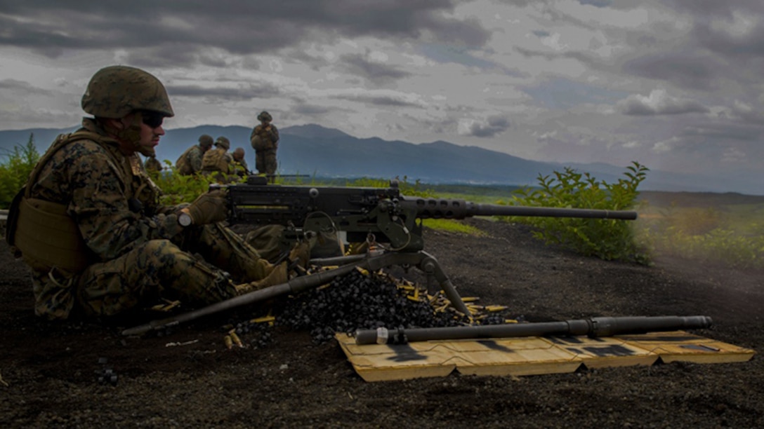 U.S. Marine Corps Pfc. Slade Wood, a cyber network operator with Marine Wing Support Squadron 171, based out of Marine Corps Air Station Iwakuni, shoots an M2 machine gun during phase two of Eagle Wrath 2017 at Combined Arms Training Center Camp Fuji, Japan, July 6, 2017. Phase two consisted of conducting live-fire training exercises to give MWSS-171 the knowledge and confidence to utilize weapons systems effectively in a deployed environment. 