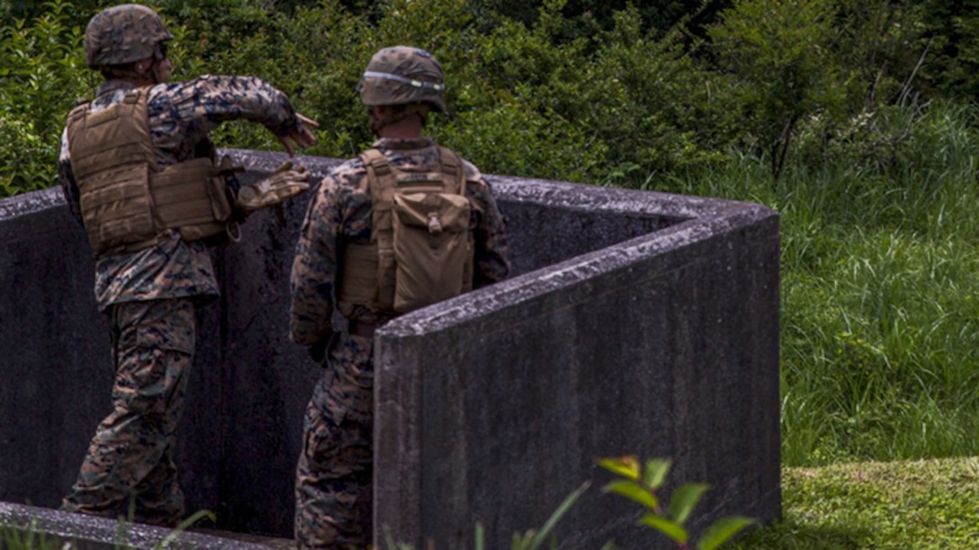 A U.S. Marine with Marine Wing Support Squadron (MWSS) 171, based out of Marine Corps Air Station Iwakuni, throws an M67 fragmentation grenade during phase two of Eagle Wrath 2017 at Combined Arms Training Center Camp Fuji, Japan, July 3, 2017. Phase two consisted of conducting live-fire training exercises to give MWSS-171 the knowledge and confidence to utilize weapons systems effectively in a deployed environment.