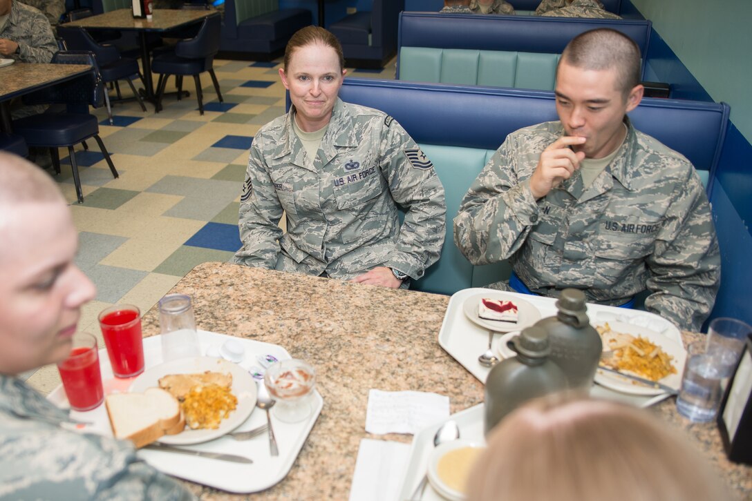 Tech. Sgt. Megan Harper, A 326th Training Squadron military training instructor facilitator, eats with Airmen inside the 326th TRS dining facility at Joint Base San Antonio-Lackland, Texas June 28, 2017. As a facilitator, Harper’s job is to facilitate classes during Airmen’s Week, a transitionary character development period between basic military training and technical school when Airmen have the opportunity to apply and internalize the Air Force creed and core values taught during BMT. 