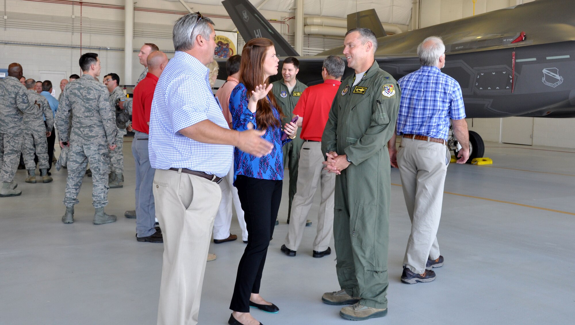 Col. David Smith, 419th Fighter Wing commander, talks to business leaders from Georgia about the F-35 Lightning II during an official Air Force civic leader tour at Hill Air Force Base, Utah, July 12.