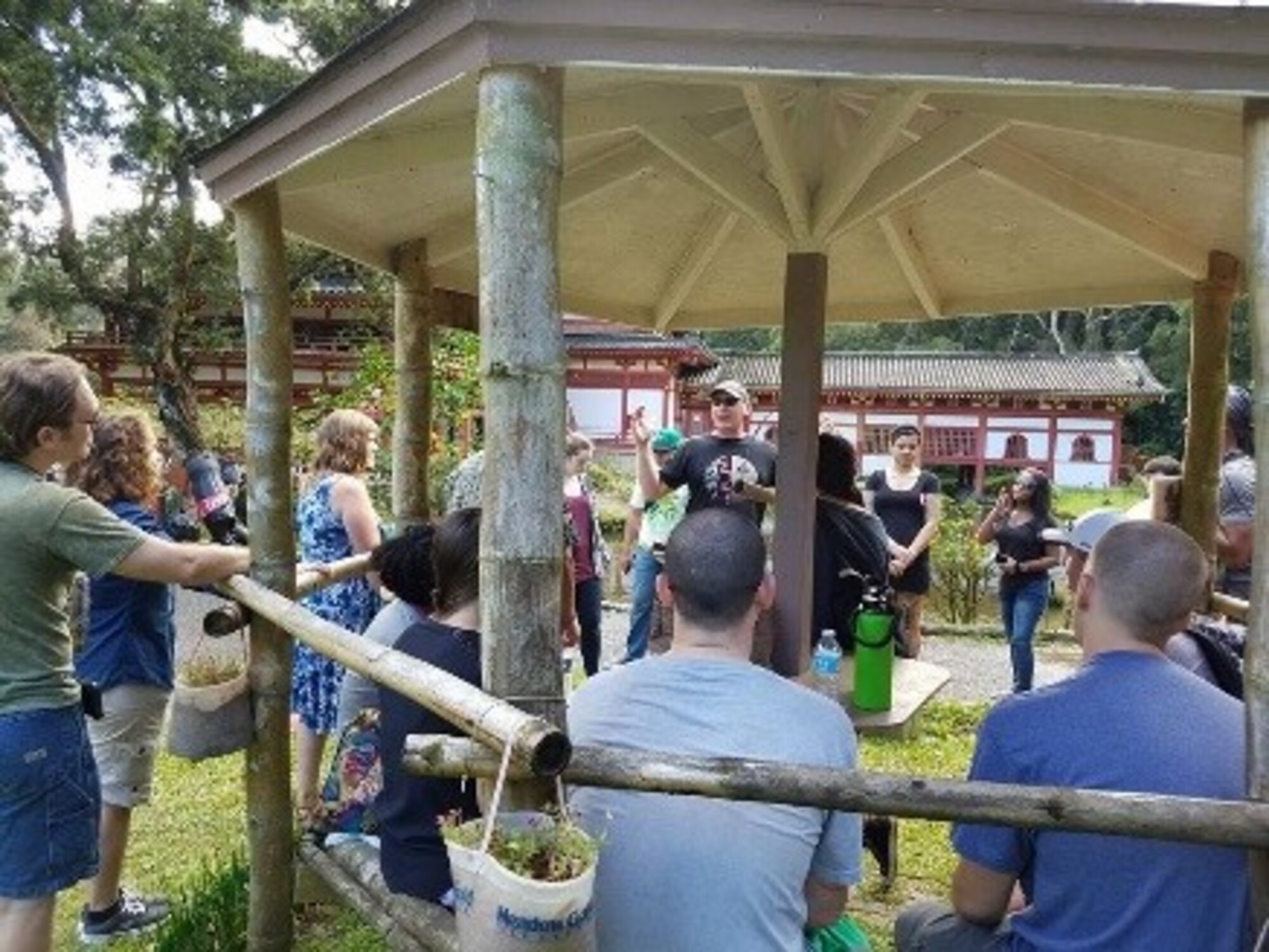 Chaplain (Capt.) Ryan Ayers, 692nd Intelligence Surveillance Recognizance Group, teaches about the history and cultural impact of Buddhism at the Spiritual Enlightenment Series event here in Oahu, Hawaii. (Courtesy photo by Master Sgt. Marie Mahoney)