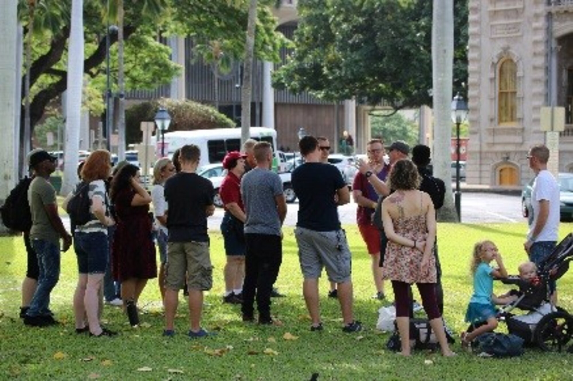 Chaplain (Capt.) Ryan Ayers, 692nd Intelligence Surveillance Recognizance Group, teaches about the history and cultural impact of Christianity on the Ialoni Palace Lawn at the Spiritual Enlightenment Series event here in Oahu, Hawaii. (Courtesy photo by Staff Sgt. Bradley Whitehouse)
 
