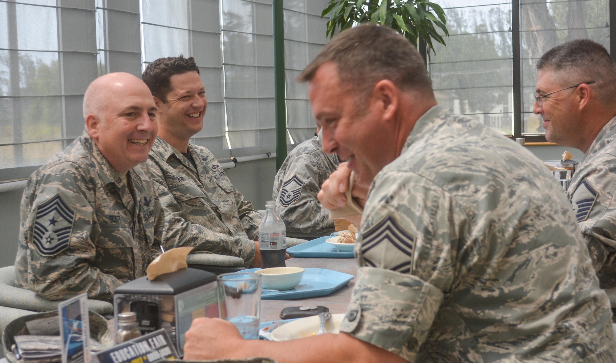 VANDENBERG AIR FORCE BASE, Cali. -- Command Chief Master Sgt. Todd Scott, 310th Space Wing, visits with members of the 9th Combat Operations Squadron during an enlisted luncheon at the base dining facility on Sunday, July 9, 2017. Scott and Col. Traci Kueker-Murphy, 310 SW commander, visited 9 COS to get better insight of this geographically separated unit during the July Unit Training Assembly. (U.S. Air Force photo/Senior Airman Laura Turner)