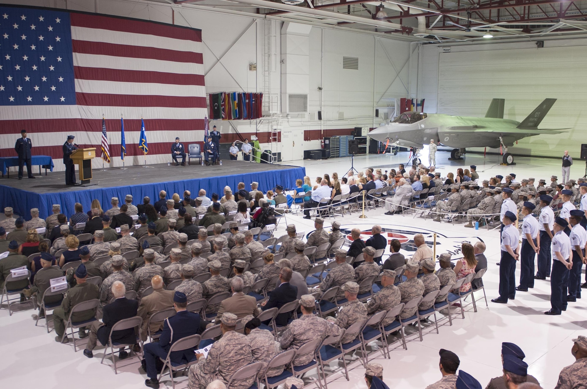 Airmen assigned to various units across Nellis Air Force Base, Nev., attend a U.S. Air Force Warfare Center change of command ceremony July 13, 2017. During the ceremony, USAFWC command was transferred from Maj. Gen. Glen VanHerck to Maj. Gen. Peter Gersten. (U.S. Air Force photo by Senior Airman Joshua Kleinholz) 