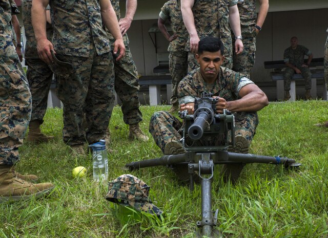 U.S. Marine Corps Cpl. Nicholas Boodram, an armorer attached to Marine Wing Support Squadron (MWSS) 171, based out of Marine Corps Air Station Iwakuni, teaches Marines how to manipulate an M2 machine gun safely during a weapons safety class while participating in phase two of Eagle Wrath 2017 at Combined Arms Training Center Camp Fuji, Japan, July 4, 2017. Phase two consisted of conducting live-fire training exercises to give MWSS-171 the knowledge and confidence to utilize weapons systems effectively in a deployed environment. (U.S. Marine Corps photo by Lance Cpl. Stephen Campbell)