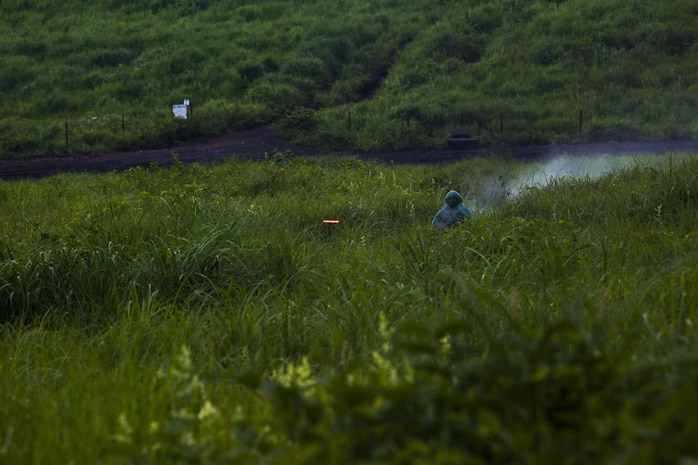 A U.S. Marine with Marine Wing Support Squadron (MWSS) 171, based out of Marine Corps Air Station Iwakuni, shoots a tracer round downrange with a M240B machine gun during phase two of Eagle Wrath 2017 at Combined Arms Training Center Camp Fuji, Japan, July 5, 2017. Phase two consisted of conducting live-fire training exercises to give MWSS-171 the knowledge and confidence to utilize weapons systems effectively in a deployed environment. (U.S. Marine Corps photo by Lance Cpl. Stephen Campbell)
