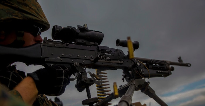 U.S. Marine Corps Lance Cpl. Christopher O’Neal, an expeditionary airfield systems technician attached to Marine Wing Support Squadron (MWSS) 171, based out of Marine Corps Air Station Iwakuni, shoots an M240B machine gun during phase two of Eagle Wrath 2017 at Combined Arms Training Center Camp Fuji, Japan, July 5, 2017. Phase two consisted of conducting live-fire training exercises to give MWSS-171 the knowledge and confidence to utilize weapons systems effectively in a deployed environment. (U.S. Marine Corps photo by Lance Cpl. Stephen Campbell)