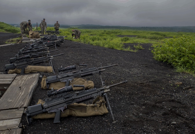 U.S. Marines with Marine Wing Support Squadron (MWSS) 171, based out Marine Corps Air Station Iwakuni, set out M240B machine guns and M249 light machine gun during the second phase of Eagle Wrath 2017 at Combined Arms Training Center Camp Fuji, Japan, July 5, 2017. Phase two consisted of conducting live-fire training exercises to give MWSS-171 the knowledge and confidence to utilize weapons systems effectively in a deployed environment. (U.S. Marine Corps photo by Lance Cpl. Stephen Campbell)