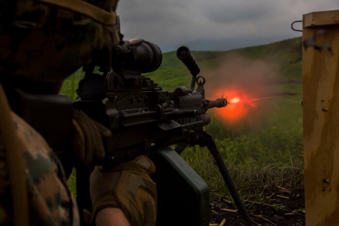 A U.S. Marine with Marine Wing Support Squadron (MWSS) 171, based out of Marine Corps Air Station Iwakuni, shoots an M249 machine gun during phase two of Eagle Wrath 2017 at Combined Arms Training Center Camp Fuji, Japan, July, 5, 2017. Phase two consisted of conducting live-fire training exercises to give MWSS-171 the knowledge and confidence to utilize weapons systems effectively in a deployed environment. (U.S. Marine Corps photo by Lance Cpl. Stephen Campbell)