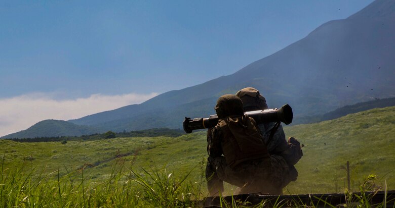 U.S. Marine Corps Lance Cpl. Sarah Kelly, a small arms repair technician with Marine Wing Support Squadron (MWSS) 171, based out of Marine Corps Air Station Iwakuni, shoots an M136E1 AT4-CS confined spaces light anti-armor weapon during phase two of Eagle Wrath 2017 at Combined Arms Training Center Camp Fuji, Japan, July 10, 2017. Phase two consisted of conducting live-fire training exercises to give MWSS-171 the knowledge and confidence to utilize weapons systems effectively in a deployed environment. (U.S. Marine Corps photo by Lance Cpl. Stephen Campbell)