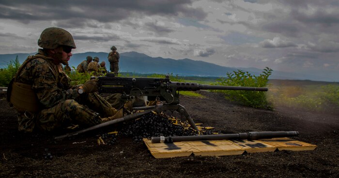 U.S. Marine Corps Pfc. Slade Wood, a cyber network operator with Marine Wing Support Squadron (MWSS) 171, based out of Marine Corps Air Station Iwakuni, shoots an M2 machine gun during phase two of Eagle Wrath 2017 at Combined Arms Training Center Camp Fuji, Japan, July 6, 2017. Phase two consisted of conducting live-fire training exercises to give MWSS-171 the knowledge and confidence to utilize weapons systems effectively in a deployed environment. (U.S. Marine Corps photo by Lance Cpl. Stephen Campbell)
