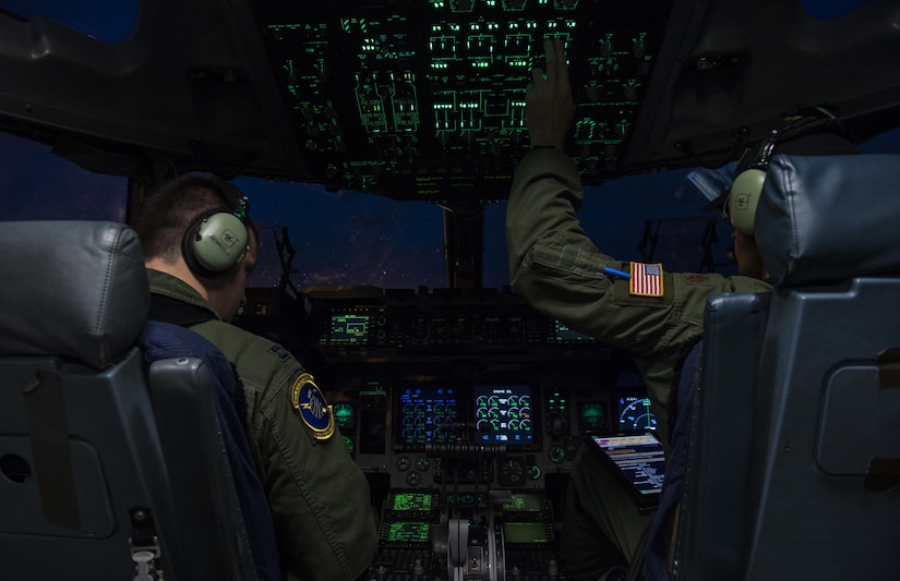 Maj. Timothy Birt and Capt. Greg Sewell, U.S. Air Force C-17 Globemaster III pilots from the 15th Airlift Squadron, 437th Airlift Wing, Joint Base Charleston, S.C., conduct pre-flight checks on the ramp at Joint Base Elmendorf-Richardson, Alaska prior to takeoff July 12, 2017 to participate in and provide airlift support for Exercise Talisman Saber 2017. The purpose of TS17 is to improve U.S.-Australian combat readiness, increase interoperability, maximize combined training opportunities and conduct maritime prepositioning and logistics operations in the Pacific. TS17 also demonstrates U.S. commitment to its key ally and the overarching security framework in the Indo Asian Pacific region.