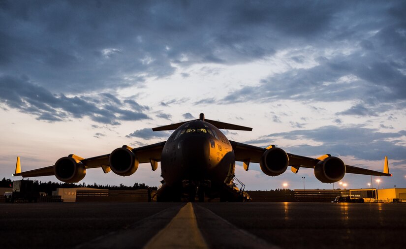 A U.S. Air Force C-17 Globemaster III from Joint Base Charleston, S.C., sits on the ramp at Joint Base Elmendorf-Richardson, Alaska prior to takeoff July 12, 2017 to participate in and provide airlift support for Exercise Talisman Saber 2017. The purpose of TS17 is to improve U.S.-Australian combat readiness, increase interoperability, maximize combined training opportunities and conduct maritime prepositioning and logistics operations in the Pacific. TS17 also demonstrates U.S. commitment to its key ally and the overarching security framework in the Indo Asian Pacific region.