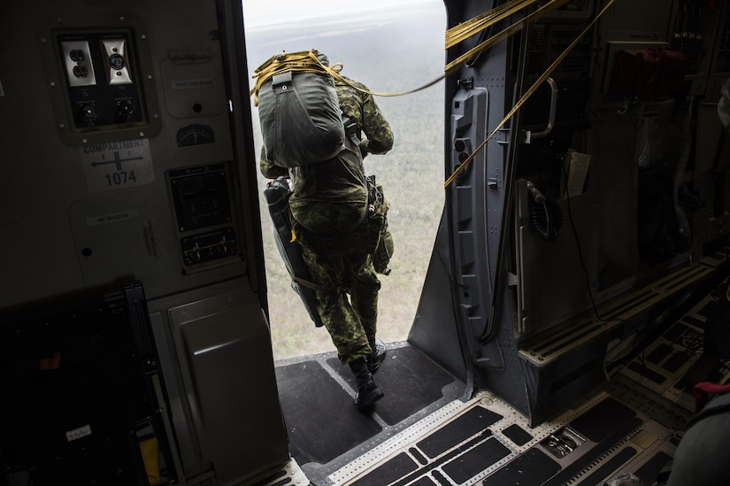 A Canadian paratrooper from Princess Patricia’s Light Canadian Infantry jumps out of the open troop door on a U.S. Air Force C-17 Globemaster III from Joint Base Charleston, S.C., July 12, 2017 in support of Exercise Talisman Saber 2017. The purpose of TS17 is to improve U.S.-Australian combat readiness, increase interoperability, maximize combined training opportunities and conduct maritime prepositioning and logistics operations in the Pacific. TS17 also demonstrates U.S. commitment to its key ally and the overarching security framework in the Indo Asian Pacific region.