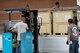 Members of the 374th Medical Support Squadron and the 374th Traffic Management Office work together loading medical supplies onto a truck, June 29, 2017, at Yokota Air Base, Japan. Yokota AB delivered their surplus of En-Route Patient Staging Systems to Misawa Air Base via ground transportation.