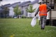 Airman Michael Agostino, 52nd Communications Squadron client systems technician, picks up trash during Spangdahlem's Eifel Pride base cleanup at Spangdahlem Air Base, Germany, May 18, 2017. The two-week program improves base appearance while also allowing Spangdahlem’s first-term Airmen in-process and become familiar with their new duty station. (U.S. Air Force photo by Senior Airman Preston Cherry)