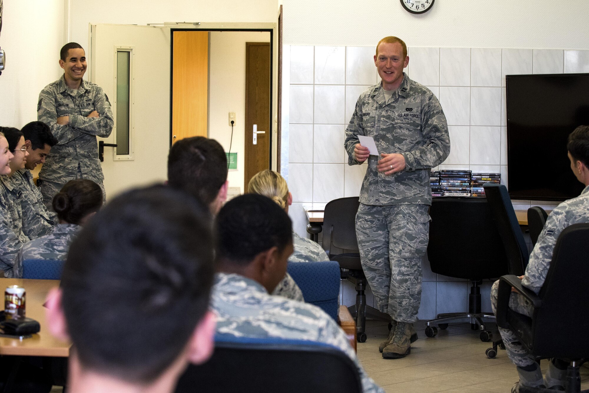 Airmen participating in Spangdahlem's Eifel Pride Program search for trash during a base cleanup at Spangdahlem Air Base, Germany, May 18, 2017. The two week program improves base appearance while also allowing Spangdahlem’s first-term Airmen to in-process and become more familiar with their new duty station. (U.S. Air Force photo by Senior Airman Preston Cherry)