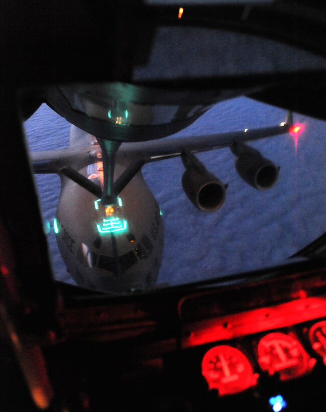 A C-17 Globlemaster III, receives fuel from a KC-135 Stratotanker during a refueling mission as part of exercise Talisman Saber 2017, July 12, 2017, over the Pacific ocean. Talisman Saber 2017 is a joint exercise between the U.S. and Australia Defense Force. (U.S. Air Force photo/Staff Sgt. Rachel Waller)