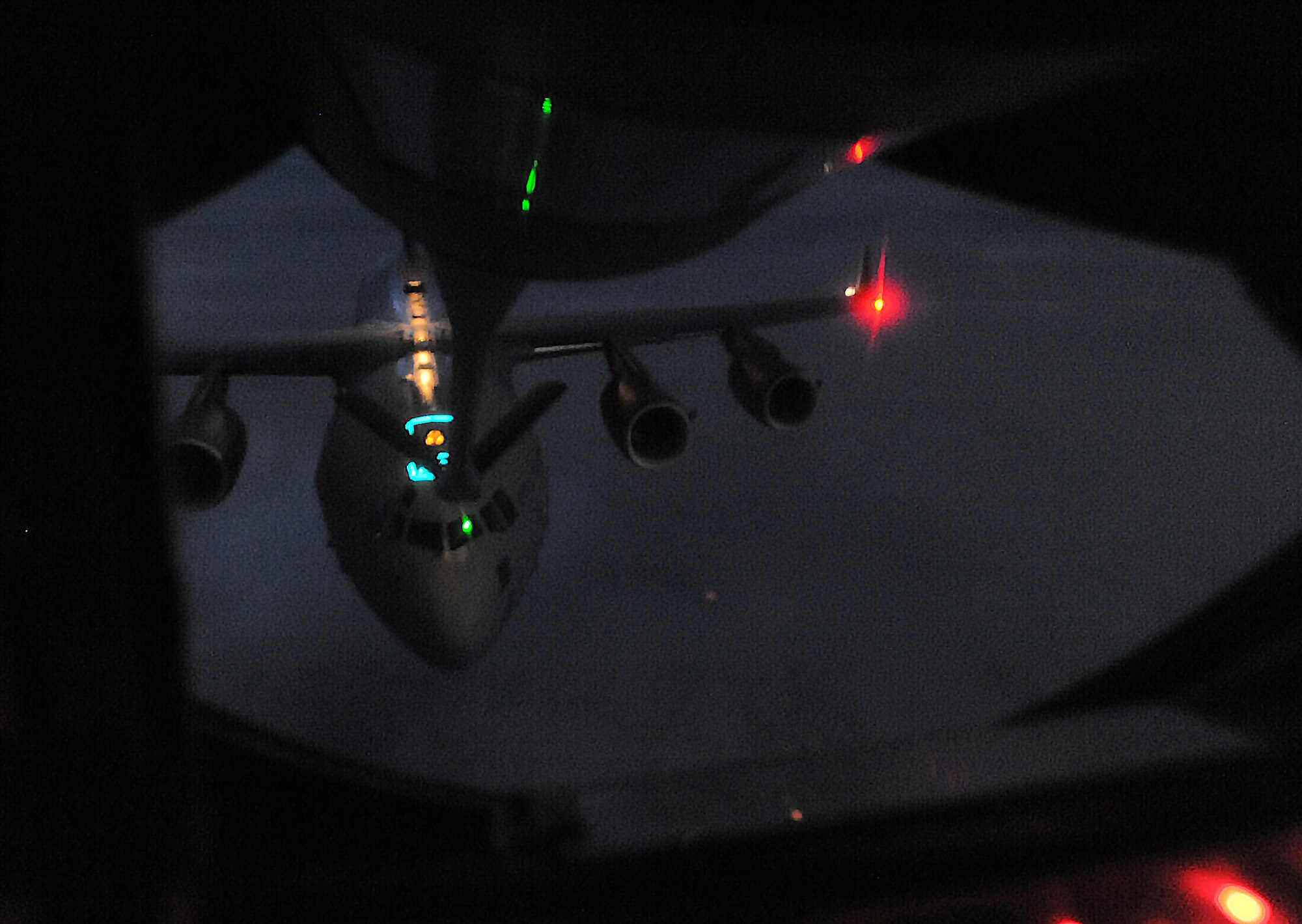 An Australian C-17 Globemaster III approaches a KC-135 Stratotanker to receive fuel as part of Talisman Saber 2017, July 12, 2017, over the Pacific ocean. One goal of the bi-annual joint exercise between U.S. and Australia forces is to strengthen interservice relationships and increase global security. (U.S. Air Force photo/Staff Sgt. Rachel Waller)