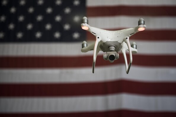 An unmanned aircraft system hovers in the air during a live-demonstration at Bagram Airfield, Afghanistan, June 30, 2017. The 455th ESFS teamed up with a researcher from the Air Force Research Lab to teach Airmen how to pilot drones and use them to train coalition partners on how to react to them on the battlefield. (U.S. Air Force photo by Staff Sgt. Benjamin Gonsier) 