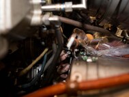 Staff Sgt. Lindsay Hallford, 86th Maintenance Squadron aerospace propulsion craftsman, inspects a C-130J Super Hercules engine for wear and tear at the 86th MXS Isochronal Dock on Ramstein Air Base, Germany, July 12, 2017. Each aircraft in Ramstein’s C-130 fleet undergoes an inspection every 270 days to make sure that they are performing optimally. (U.S. Air Force photo by Senior Airman Elizabeth Baker)