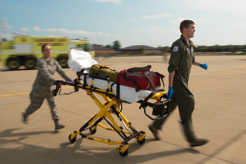 U.S. Air Force Capt. Stephen Kastler, 94th Fighter Squadron flight surgeon responds to the aircraft incident exercise at Joint Base Langley-Eustis, Va. July 11, 2017. The exercise was used to inspect and evaluate base capabilities, while also allowing Airmen to learn from their mistakes, better preparing them for real-world scenarios. (U.S. Air Force photo/Staff Sgt. Carlin Leslie)