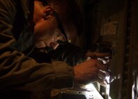 Tech. Sgt. Scott Holman, 86th Maintenance Squadron repair and reclamation NCO in charge, inspects a C-130J Super Hercules for wear and tear at the 86th MXS Isochronal Dock on Ramstein Air Base, Germany, July 12, 2017. Repair and reclamation personnel are some of the many specialists who team up to keep Ramstein’s fleet in top condition so that aircrews can fly safely and focus on the mission. (U.S. Air Force photo by Senior Airman Elizabeth Baker)