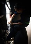 Staff Sgt. Jacob Law, 86th Maintenance Squadron repair and reclamation craftsman, inspects the landing gear of a C-130J Super Hercules for wear and tear at the 86th MXS Isochronal Dock on Ramstein Air Base, Germany, July 12, 2017. Ramstein’s Isochronal Dock is designed to inspect and repair C-130Js in order to give the flight line reliable aircraft. (U.S. Air Force photo by Senior Airman Elizabeth Baker)