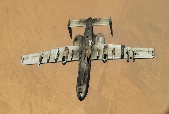 An A-10 Thunderbolt II departs after receiving fuel from a 340th Expeditionary Air Refueling Squadron KC-135 Stratotanker during a flight in support of Operation Inherent Resolve, July 6, 2017. The A-10 employs a wide variety of conventional munitions in support of OIR and the destruction of the Islamic State of Iraq and Syria. (U.S. Air Force photo/ Staff Sgt. Trevor T. McBride)