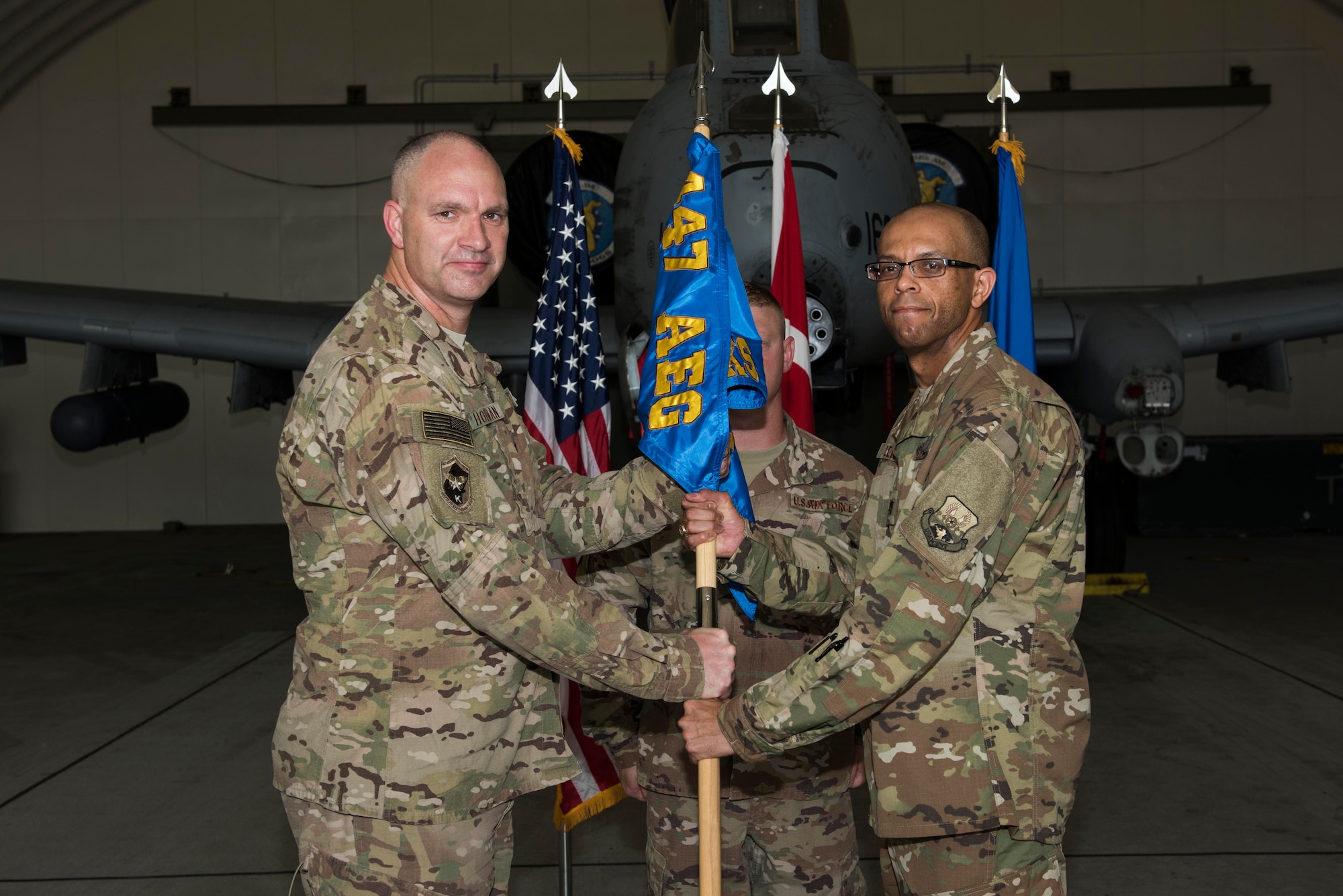 U.S. Air Force Maj. Yogi Lebby (right), 447th Expeditionary Aircraft Maintenance Squadron incoming commander, assumes command from Col. Scott Hoffman, 447th Air Expeditionary Group commander, July 14, 2017, at Incirlik Air Base, Turkey. A change of command ceremony is a tradition that represents a formal transfer of authority and responsibility from the outgoing commander to the incoming commander. (U.S. Air Force photo by Airman 1st Class Devin M. Rumbaugh)
