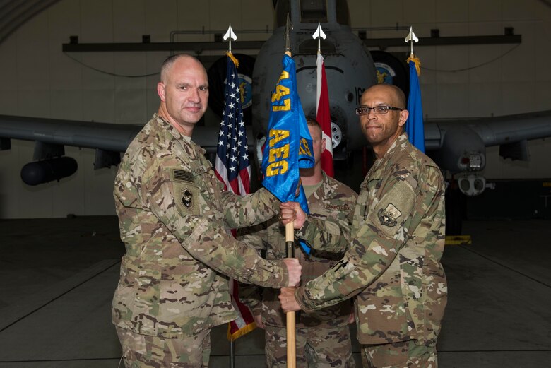 U.S. Air Force Maj. Yogi Lebby (right), 447th Expeditionary Aircraft Maintenance Squadron incoming commander, assumes command from Col. Scott Hoffman, 447th Air Expeditionary Group commander, July 14, 2017, at Incirlik Air Base, Turkey. A change of command ceremony is a tradition that represents a formal transfer of authority and responsibility from the outgoing commander to the incoming commander. (U.S. Air Force photo by Airman 1st Class Devin M. Rumbaugh)