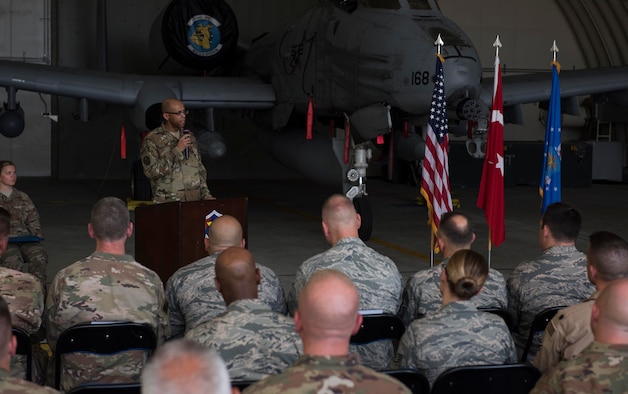 U.S. Air Force Maj. Yogi Lebby, 447th Expeditionary Aircraft Maintenance Squadron incoming commander, speaks with a group of Airmen, after assuming command July 14, 2017, at Incirlik Air Base, Turkey. A change of command ceremony is a tradition that represents a formal transfer of authority and responsibility from the outgoing commander to the incoming commander. (U.S. Air Force photo by Airman 1st Class Devin M. Rumbaugh)
