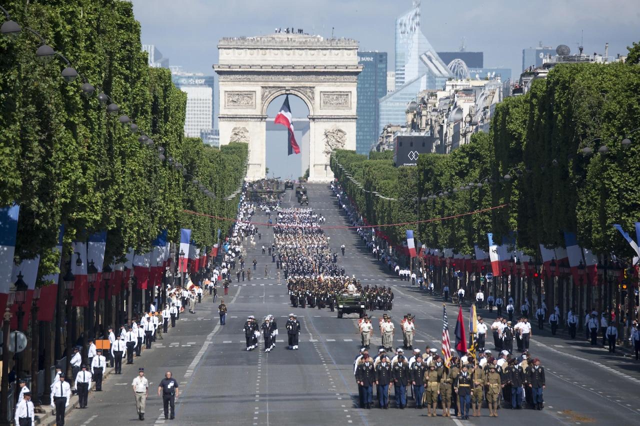 American soldiers, sailors, airmen and Marines lead the annual Bastille Day military parade down the Champs-Elysees in Paris, July 14, 2017. DoD photo by Navy Petty Officer 2nd Class Dominique Pineiro