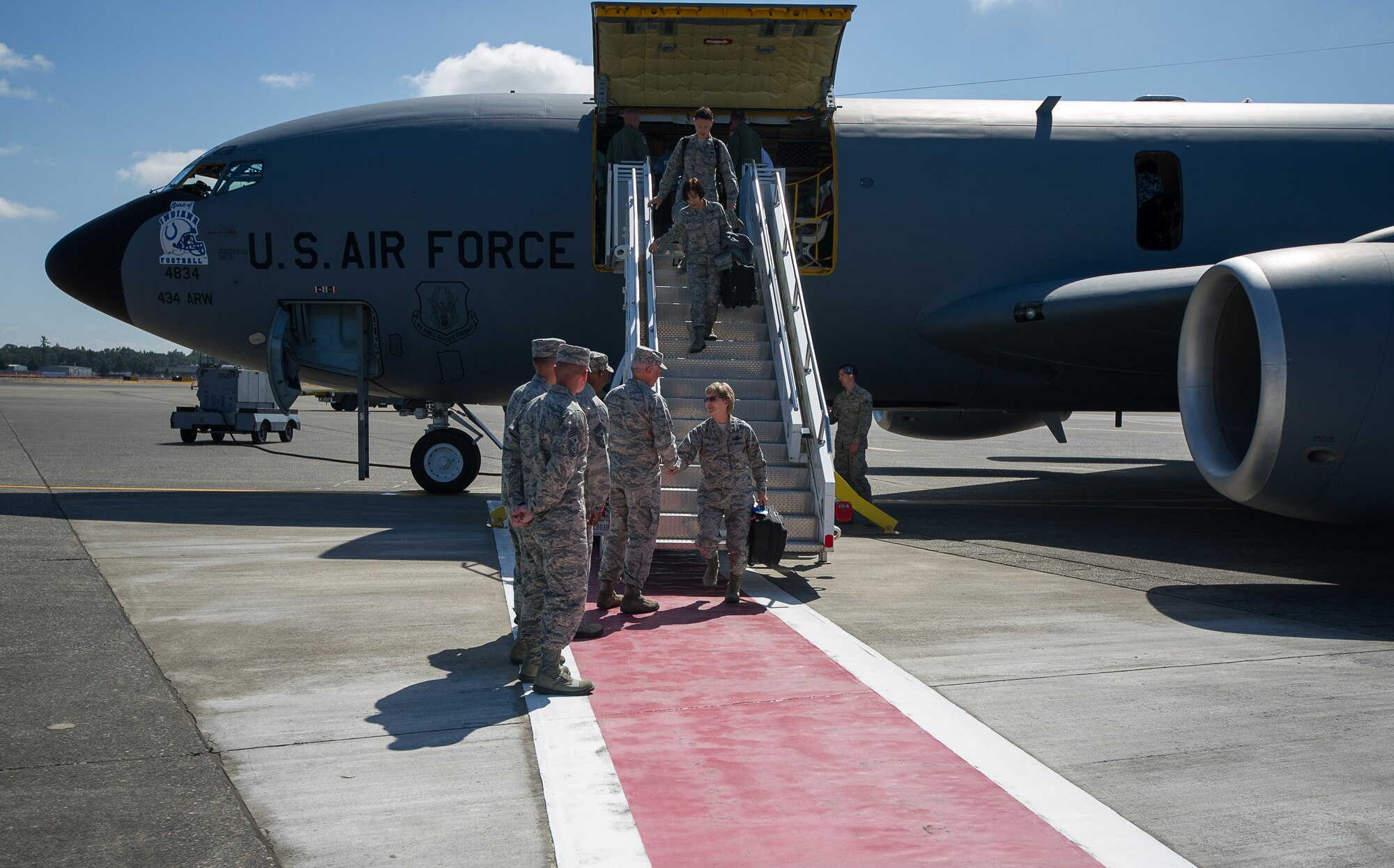 Lt. Gen. Maryanne Miller, the chief of Air Force Reserve and commander, Air Force Reserve Command, is greeted by Col. Scott L. McLaughlin, 446th Airlift Wing commander, as she arrives for the Civic Leader Tour at Joint Base Lewis-McChord, Wash., July 11. Civic leaders from the Robbins Air Force Base, Georgia, area ventured to the Pacific Northwest to learn about the Joint Base Lewis-McChord mission. (U.S. Air Force photo by Tech. Sgt. Bryan Hull)