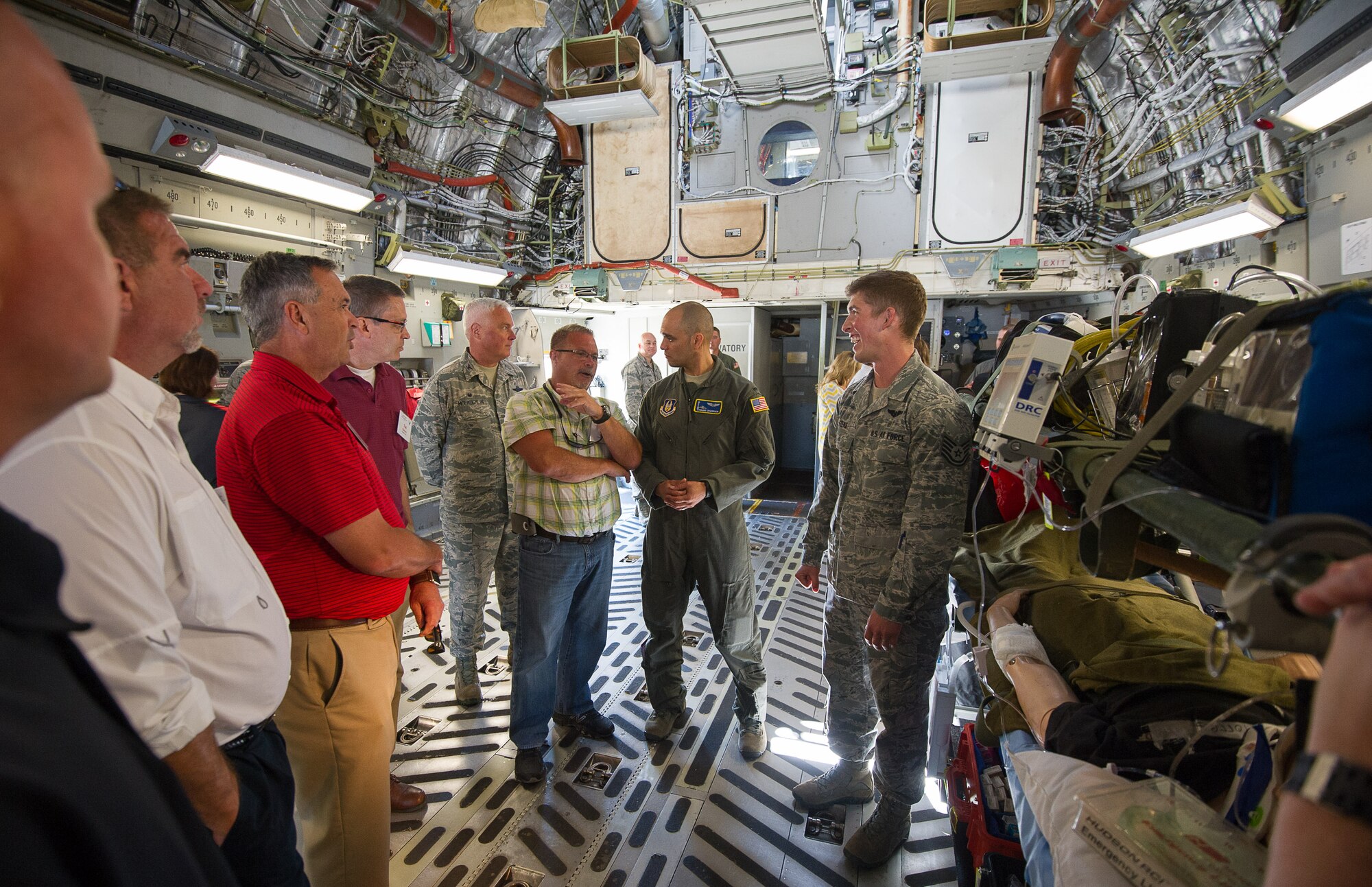 Civic leaders from Georgia learn about the 446th Aeromedical Evacuation Squadron during their Civic Leader Tour C-17 static display at McChord Field. The C-17 static was also manned by Flying Crew Chiefs, loadmasters and pilots. The civic leaders were able to learn about each of those career fields. (U.S. Air Force photo by Tech. Sgt. Bryan Hull)