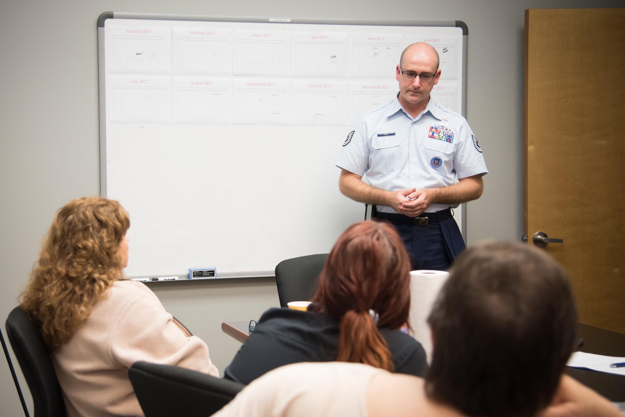 Tech. Sgt. David Rau, 403rd Wing recruiter, conducts a center of influence meeting with radio media members to tell them about the opportunities and benefits of the Air Force Reserve July 11, 2017 in Hattiesburg, Mississippi. (U.S. Air Force photo/Staff Sgt. Heather Heiney)