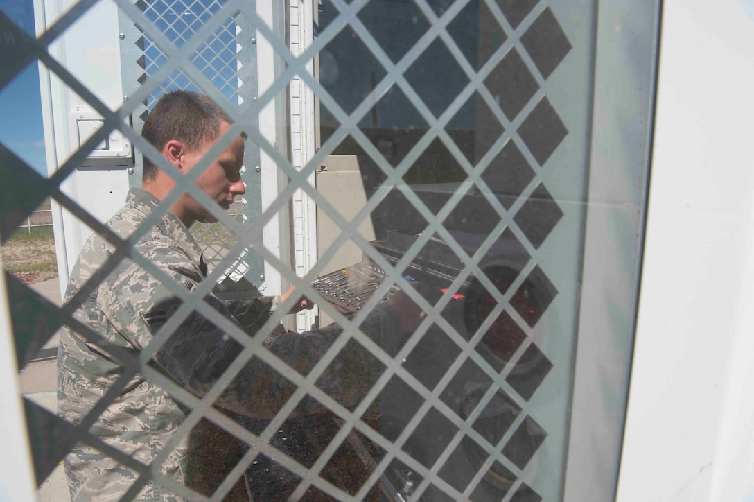 Airman 1st Class Alex Medellin, 90th Missile Maintenance Squadron team member, checks his tools in the utility van during code change at a launch facility in the 90th Missile Wing missile complex, June 20, 2017. The maintainers are in charge of effectively gaining access to the launch facility with security forces standing guard ensuring they can perform their mission securely during the code change. Code change ensures the safety, security and effectiveness of America’s ICBM arsenal, which is the bedrock of nuclear deterrence. (U.S. Air Force photo by Staff Sgt. Christopher Ruano)