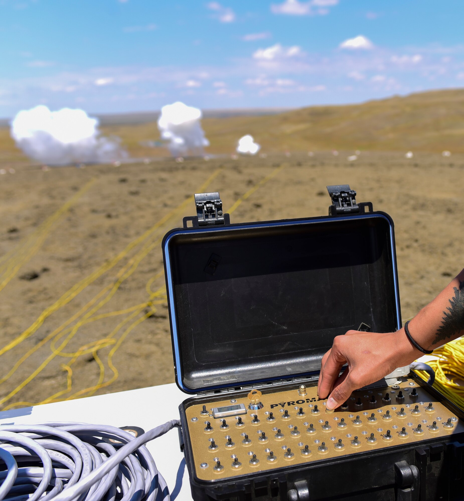 An FBI Special Agent Bomb Technician detonates a homemade explosive during a National Improvised Explosive Familiarization course at Ellsworth Air Force Base, S.D., July 12, 2017. Participants in the class were able to watch each explosive detonate and witness how different combinations of common household ingredients react together in an explosion. (U.S. Air Force photo by Airman 1st Class Randahl J. Jenson)