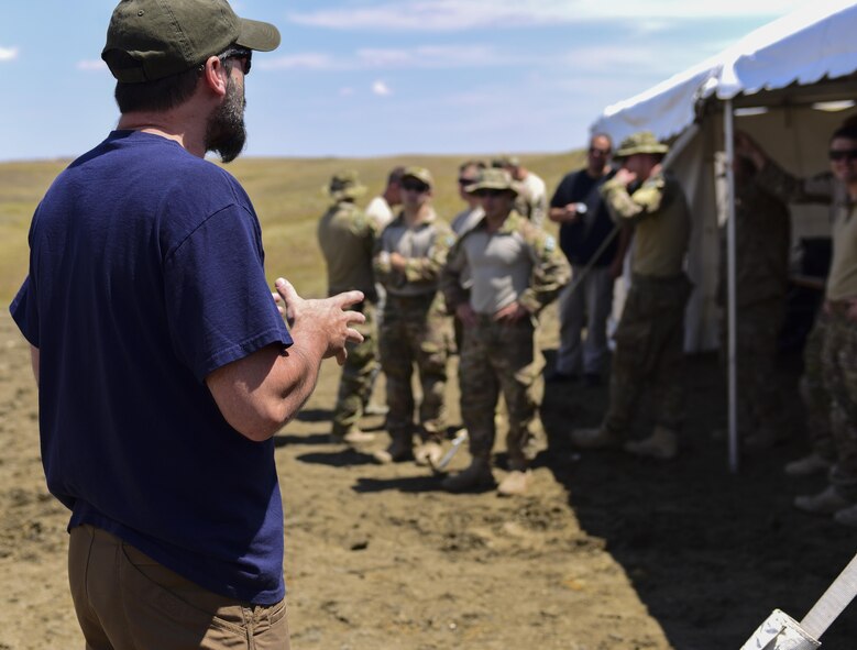 An FBI Special Agent Bomb Technician instructs a group of 28th Civil Engineer Squadron Explosive Ordinance Disposal Airmen and members of various law enforcement agencies during a National Improvised Explosive Familiarization course at Ellsworth Air Force Base, S.D., July 12, 2017. The three-day, FBI-led, joint exercise taught EOD Airmen, along with other law enforcement agencies, how to create and recognize homemade explosives. (U.S. Air Force photo by Airman 1st Class Randahl J. Jenson)  