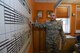 Master Sgt. Joshua Malyemezian, former 55th Contracting Squadron unit deployment manager, points to the training and readiness board Feb. 22 at Offutt Air Force Base, Nebraska. Malyemezian recently moved to the 6th Contracting Squadron, MacDill AFB, Florida, where he is the Section Chief of the Performance Management Flight. (U.S. Air Force photo by Zach Hada)