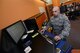 Master Sgt. Joshua Malyemezian, former 55th Contracting Squadron unit deployment manager, works on his computer Feb. 22 at Offutt Air Force Base, Nebraska. Malyemezian recently moved to the 6th Contracting Squadron, MacDill AFB, Florida, where he is the Section Chief of the Performance Management Flight. (U.S. Air Force photo by Zach Hada)