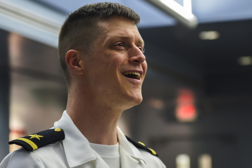 Ensign Jonathan Baumgartner, Navy Nuclear Power Training Command submarine officer student and choir member, practices in the NNPTC building July 12. The choir has been a part of NNPTC since the early 1990s and is made up of students.