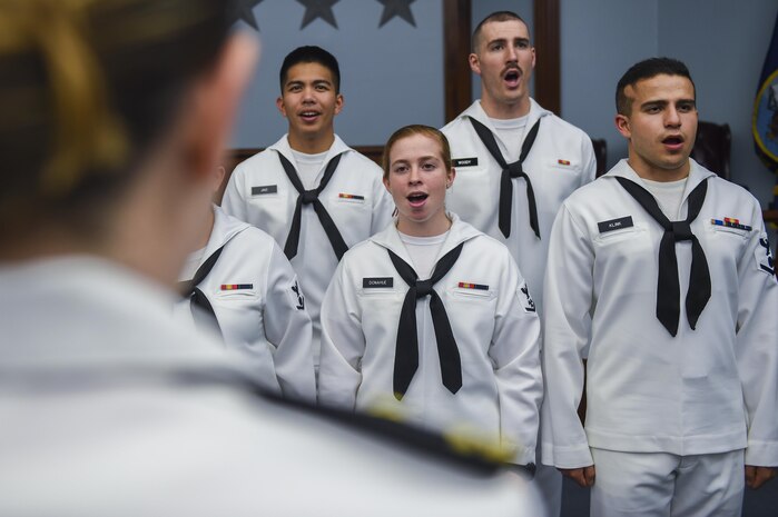 U.S. Navy Lt. Megan Brown, Navy Nuclear Power Training Command enlisted heat transfer instructor and choir director, directs the choir at the NNPTC building, July 12. The NNPTC choir gives students the opportunity to do something outside of school that gets them involved in the local community. 