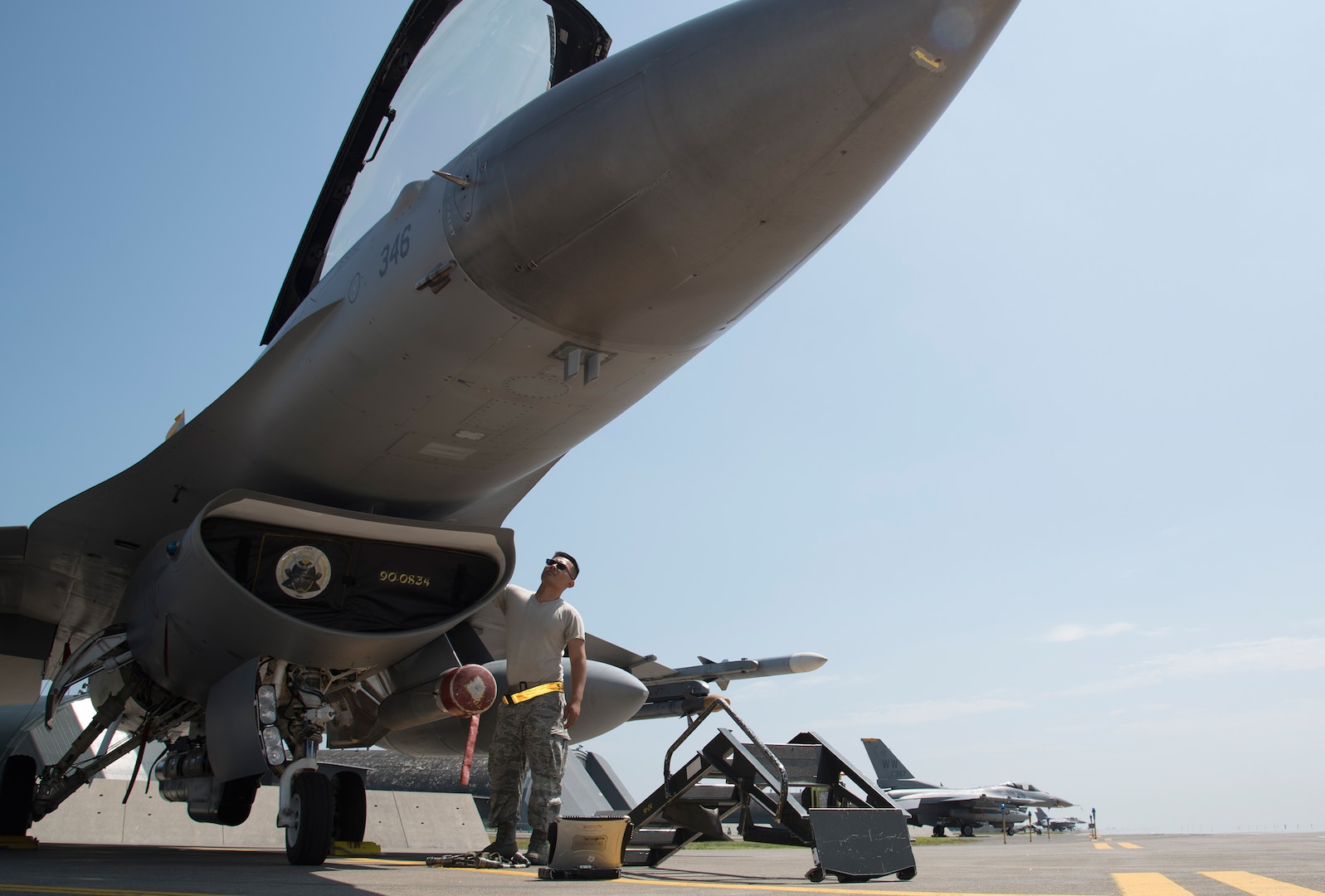 U.S. Air Force Staff Sgt. Sonethasinh Sayasaeng, a 35th Maintenance Squadron avionics technician, prepares an F-16 Fighting Falcon for an M7.1 upgrade at Misawa Air Base, Japan, July 13, 2017. The upgrade will provide pilots with more tactical information to be applied to dynamic missions.