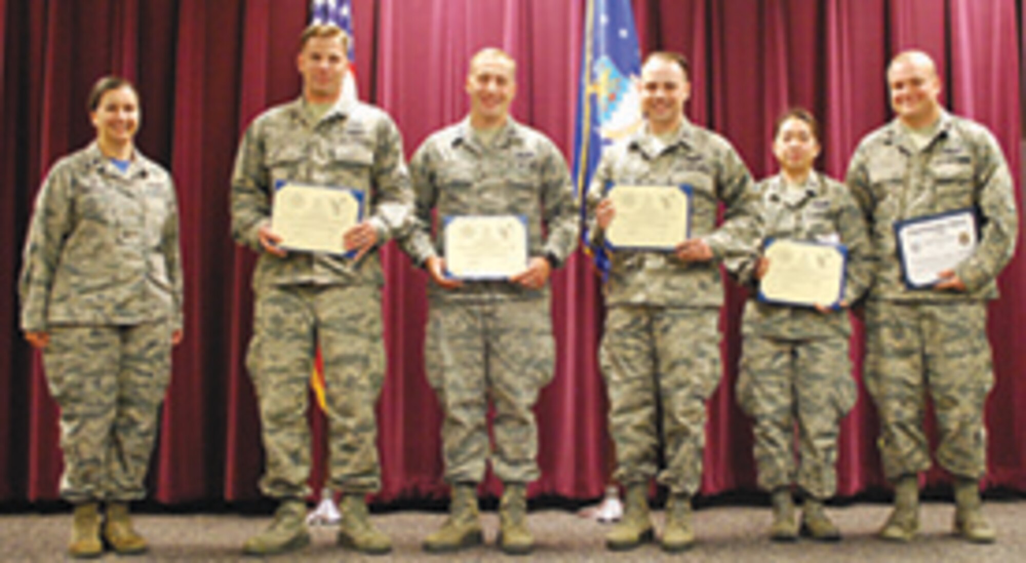 From left, Lt. Col Heather Fleishauer, Commander 752nd Operations Support Squadron, 2nd Lt. Joseph Alcorn, 116th Air Control Squadron, Portland, Ore., Capt. Michael Brode and Capt. Ryan Murphy, enroute to 726th ACS, Mountain Home AFB, Idaho, Capt. Cecilia Nguyen, 607th ACS, Luke AFB, Ariz., Capt. Nicolas Kuczera, enroute to the 607 ACS (auditing the course). The 752nd OSS celebrates the graduation of class 17-02 who have successfully completed two months of rigorous training,  finishing 42 hours of classroom academics and completing 104 hours of hands-on positional training. During their training, students were taught to employ the latest Tactical Air Operations Module AN/TYQ-23A. They are prepared for the challenging responsibilities as control and reporting center air battle managers.
