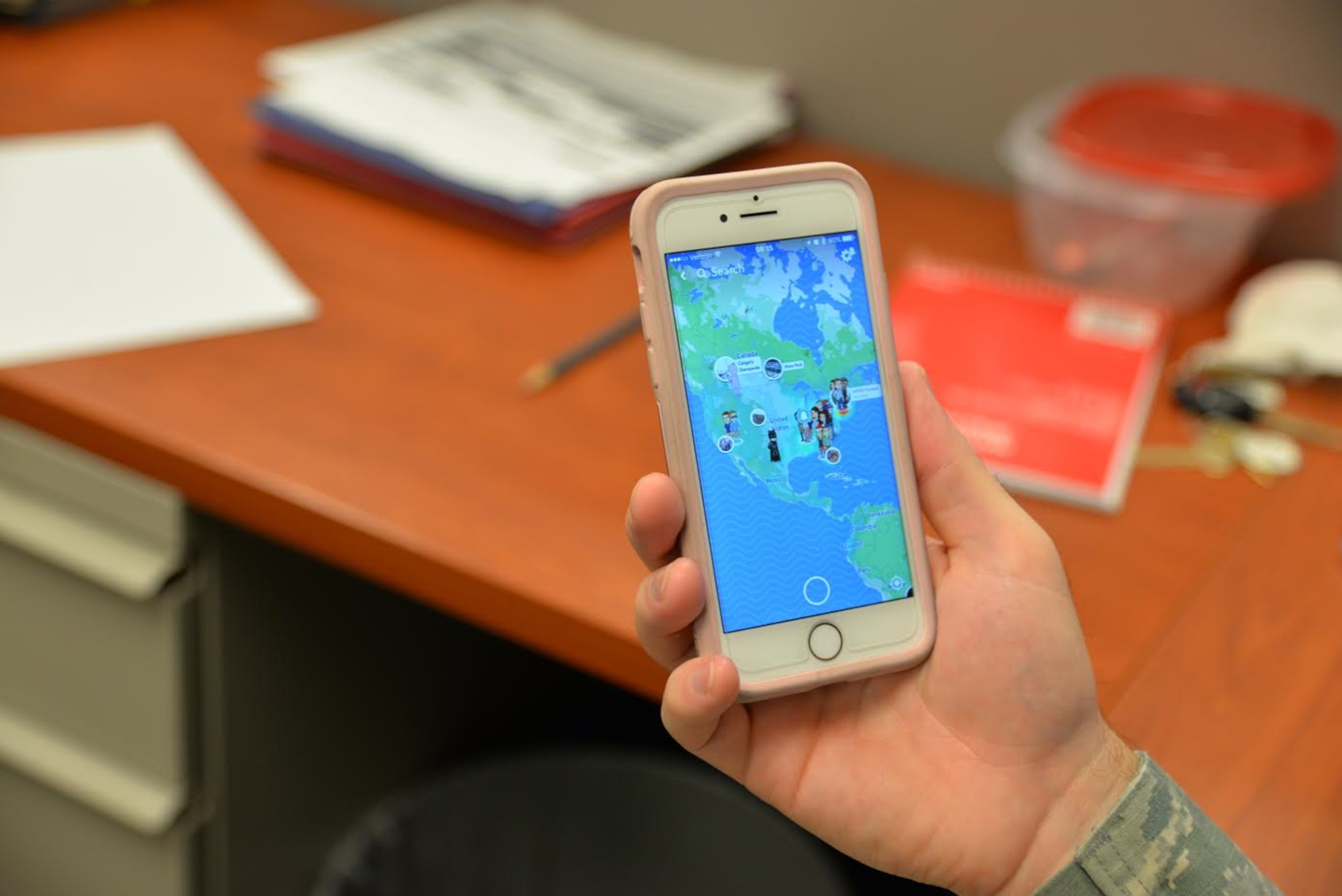 Snapchat introduced a new feature that allows users to track other users on a map. The map can be used to view their stories and see their location in real time. If a user does not want to be seen, they can activate “Ghost Mode” and be removed from the map. (U.S. Air Force photo by 2nd Lt. Savannah Stephens)