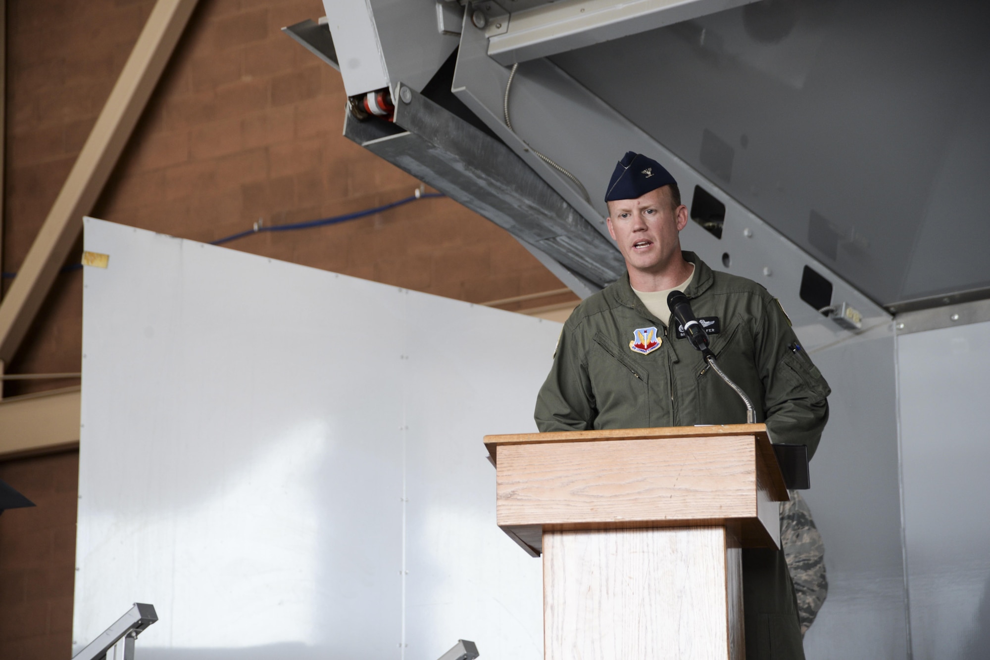 Col. Brian Schafer, 53rd Test and Evaluation Group commander, speaks to the crowd during the group’s change of command ceremony at Nellis Air Force Base, Nev., July 11, 2017. The mission of the 53rd TEG is to provide the warfighter with the latest in software, hardware, weapons and tactics, techniques and procedures. (U.S. Air Force photo by Airman 1st Class Andrew D. Sarver/Released)