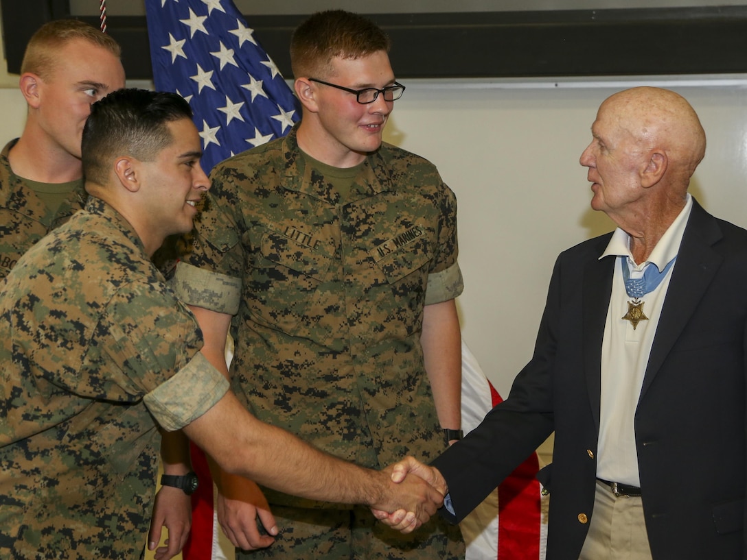U.S. Marine Corps Medal of Honor recipient Col. Robert J. Modrzejewski ret. speaks with guests about how he recived the Medal of Honor at a room dedication ceremony at the Advanced Infantry Training Battalion, School of Infantry West, Camp Pendleton, Calif, July 14, 2017. 

The ceremony was held to dedicate a classroom, now called the Hall of Heroes, to the Medal of Honor recipients of the past and present. Colonel Robert J. Modrzejewski, a Medal of Honor recipient who retired from the Marine Corps in 1986, was the ceremony’s guest of honor. (U.S. Marine Corps photo by Pfc. Noah Rudash)