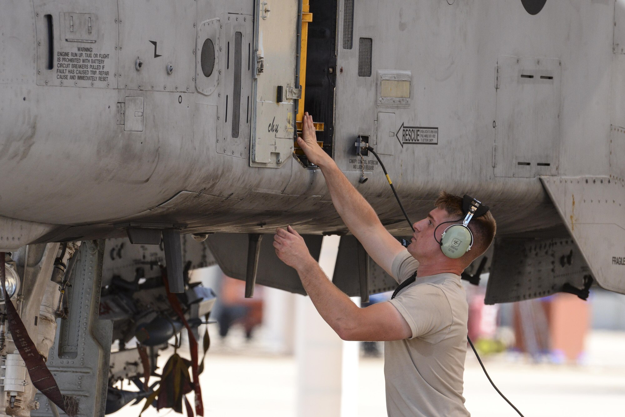 U.S. Air Force Airman 1st Class Jake Mitchell, 355th Aircraft Maintenance Squadron A-10C Thunderbolt II crew chief, prepares an A-10 for launch at Davis-Monthan Air Force Base, Ariz., July 14, 2017. The primary function of the A-10 is close air support, airborne forward air control and combat search and rescue. (U.S. Air Force photo by Senior Airman Mya M. Crosby)